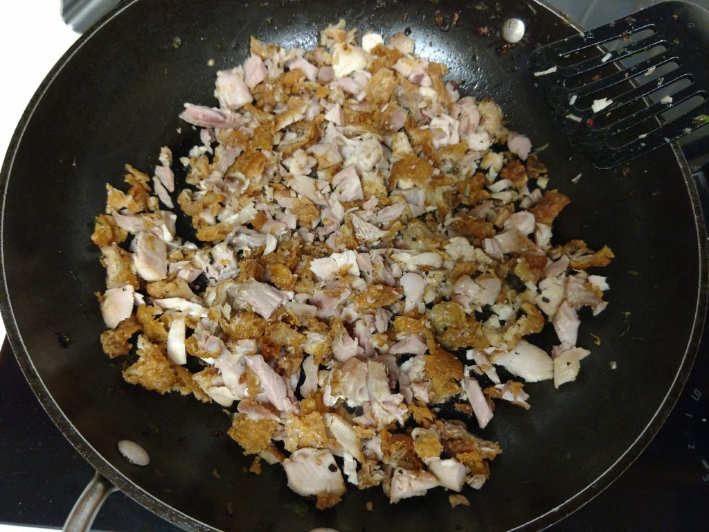 Cut up and fry the fried chicken including the breaded chicken skins.